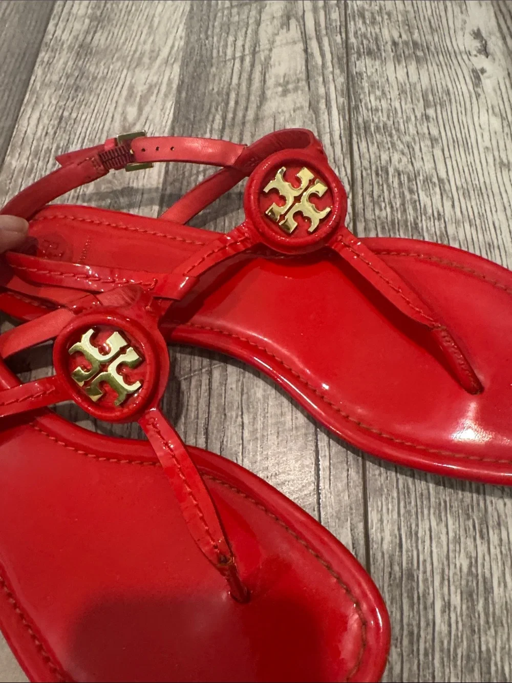 Tory Burch buckle logo polished